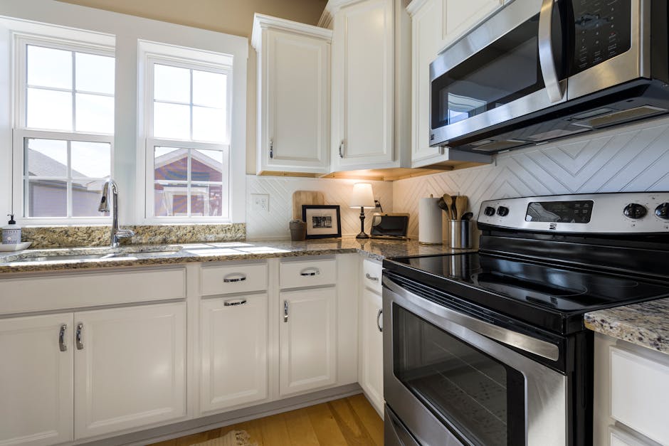 The rising popularity of range hood inserts in modern kitchen design trends